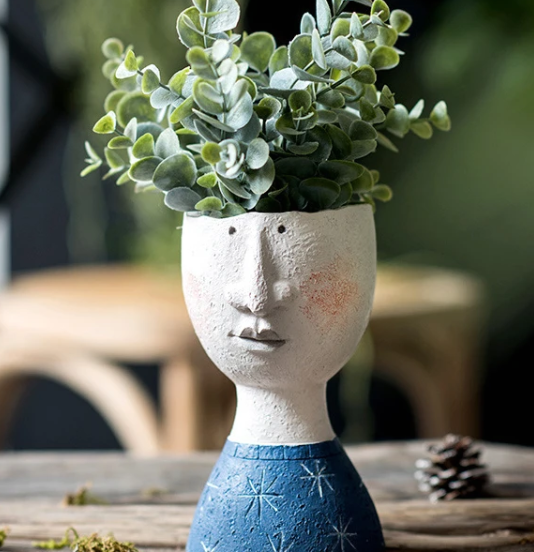 Portrait sculpture flower pot