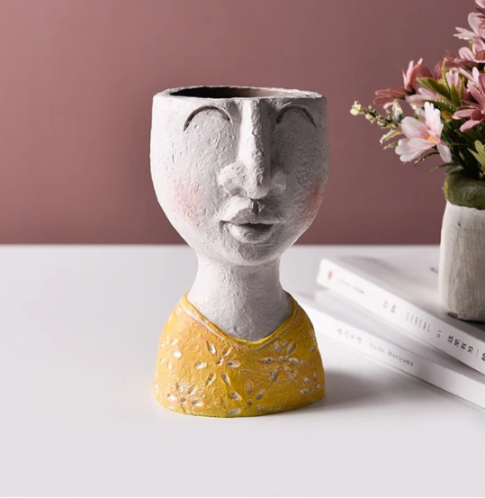 Portrait sculpture flower pot